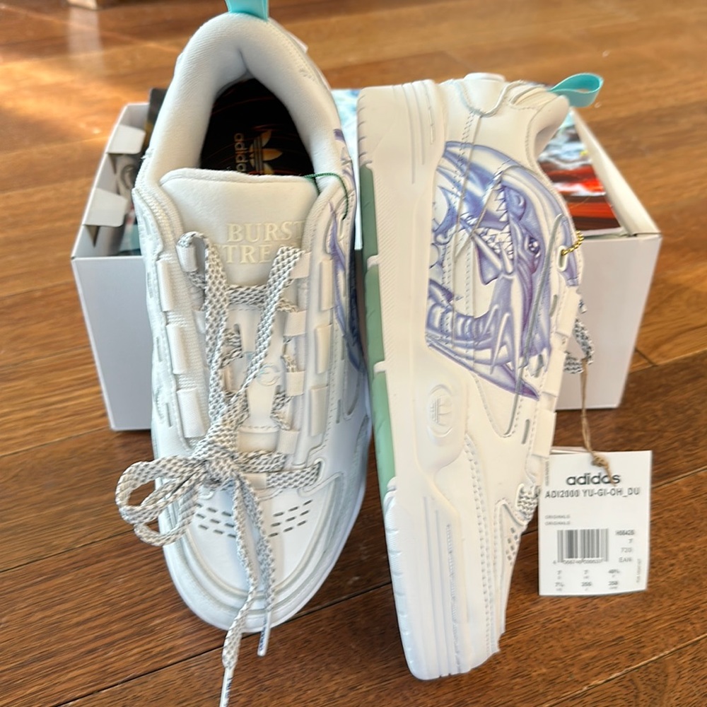 Yu-gi-oh blue eye white dragon shoes. Size 7.5 new in box, never worn. $250
